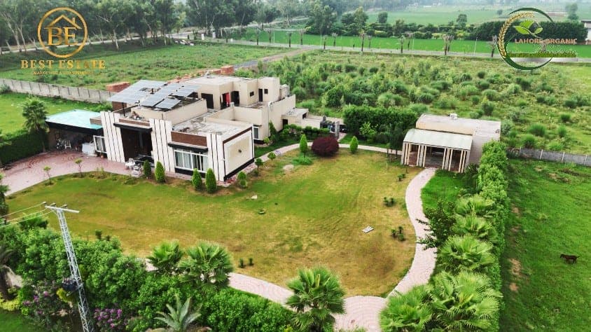 Farmhouse with landscaped lawn and garden pavilion