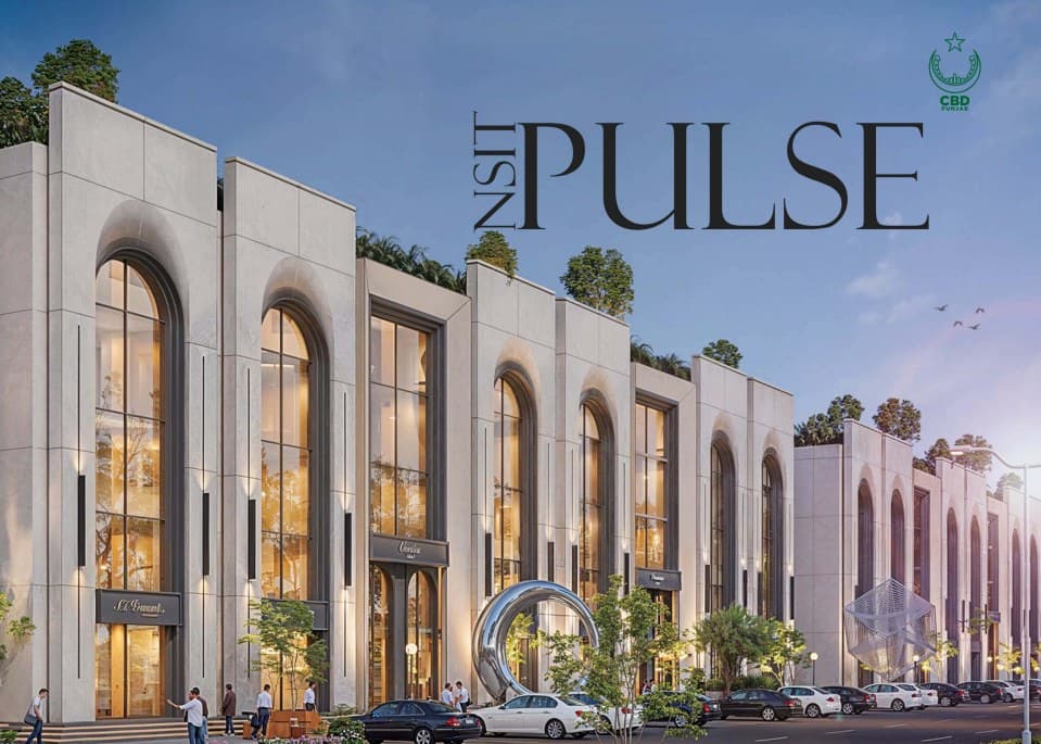 NSIT Pulse building facade at dusk — boulevard-facing retail